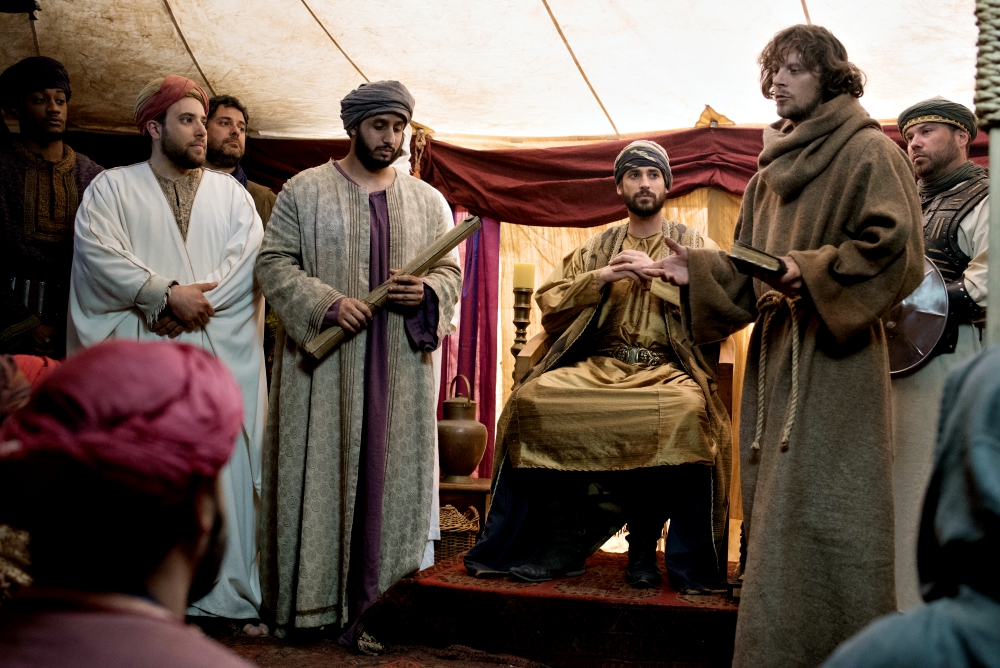 St. Francis of Assisi (Alexander McPherson) appears before the court of Egyptian Sultan Malik al-Kamil (Zack Beyer) in a scene from the documentary film "The Sultan and the Saint," which premieres on PBS Dec. 26. (UPF) St. Francis of Assisi (Alexander McPherson) appears before the court of Egyptian Sultan Malik al-Kamil (Zack Beyer) in a scene from the documentary film "The Sultan and the Saint," which premieres on PBS Dec. 26. (UPF)